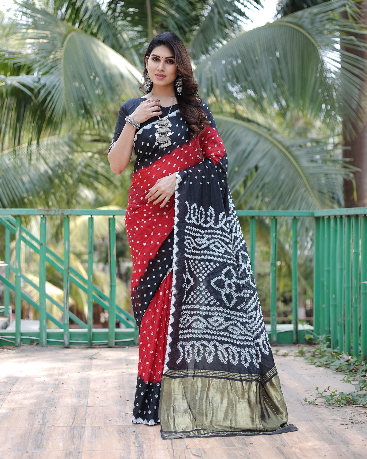 New Premium And High Quality Comfortable Bandhej Silk Drapes That is Super Stylish And Pretty Red And Black Saree